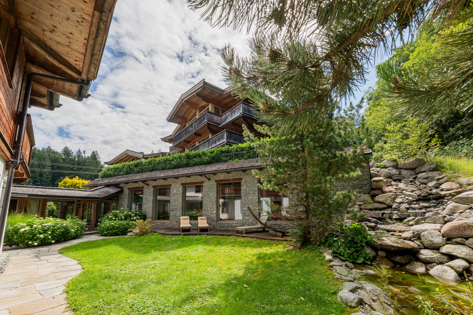 Exklusive Gartenwohnung in Ellmau – luxuriöse Wohnanlage mit Hallenbad direkt an der Skipiste